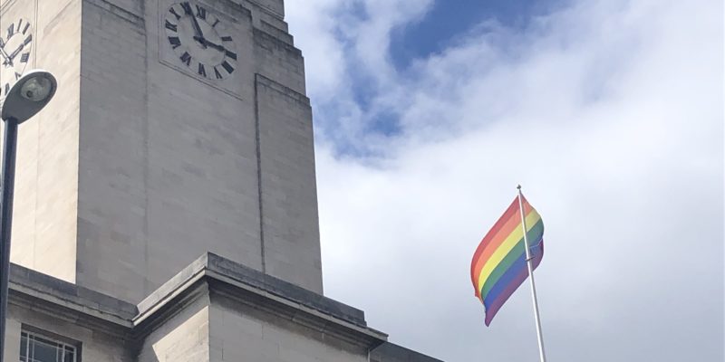 Rainbow flag next to the Parkinson Building
